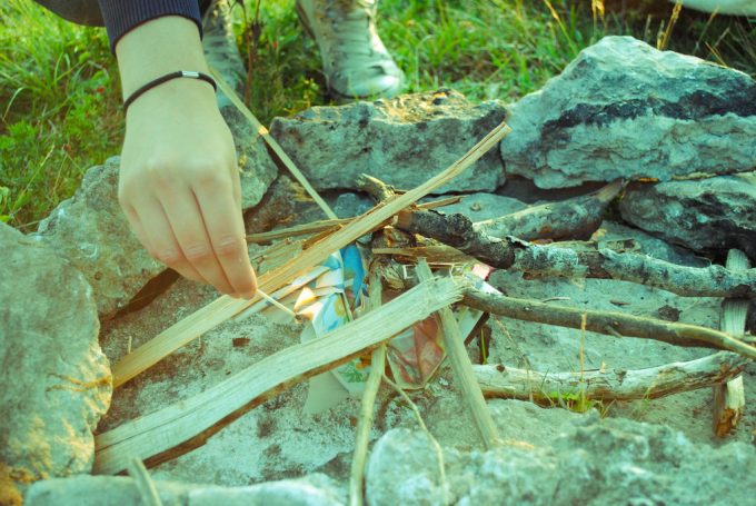starting campfire with sticks