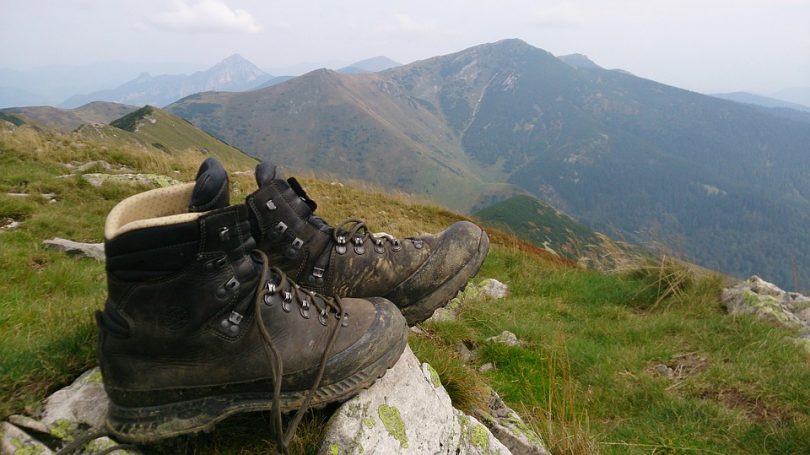 Hiking boots on a stone
