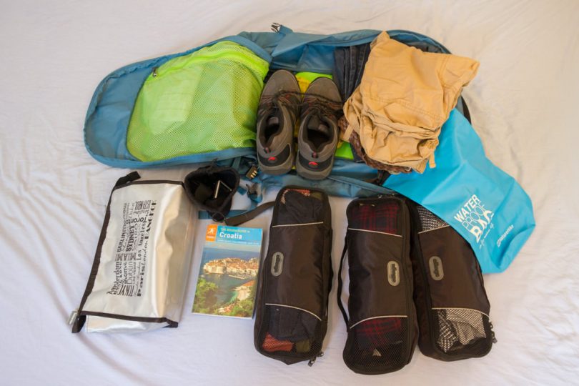 Pack clothes for traveling
