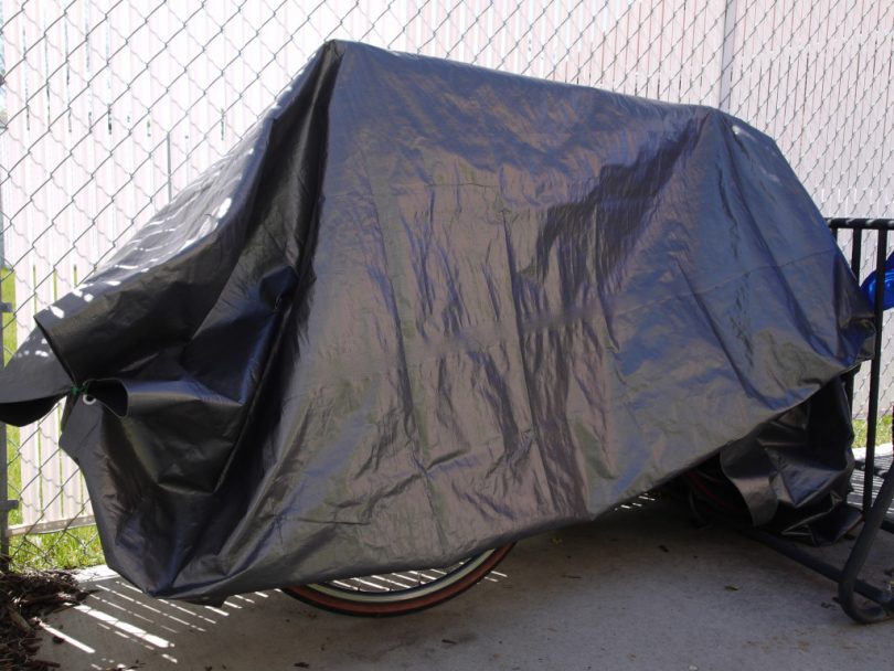 A fitted tarp on a bike