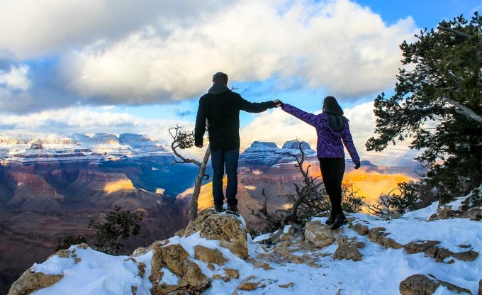 Couple holding hands Grand Canyon