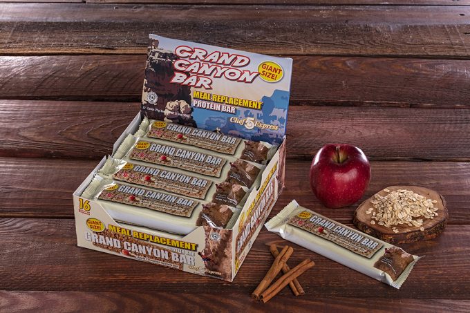 Protein bars on wooden background
