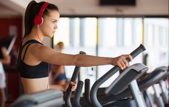 girl excercising and listening to music