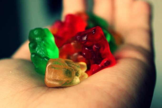 gummy bears in hand