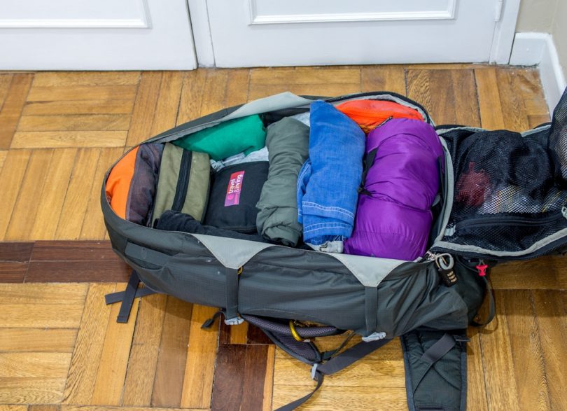 Pack clothes in a backpack