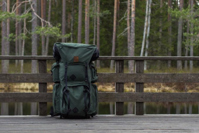 backpack on a wooden bridge