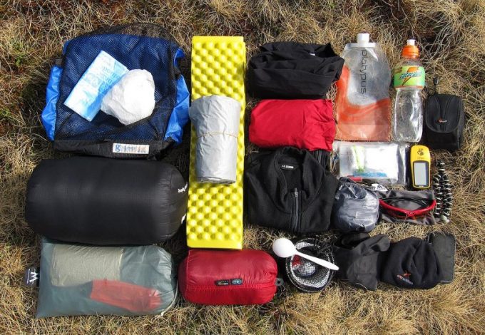 backpacking gear on the ground