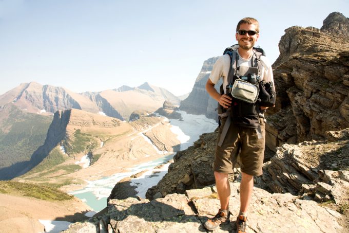 hiker with camera bag