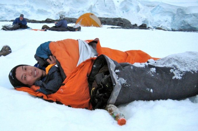 inside sleeping bag on the snow