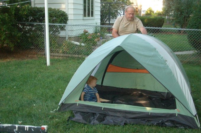 pitching a tent in the backyard