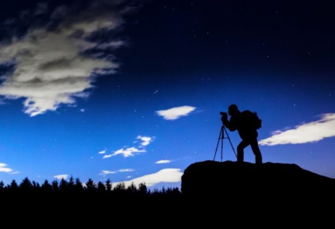 Photographer Silhouette At Night