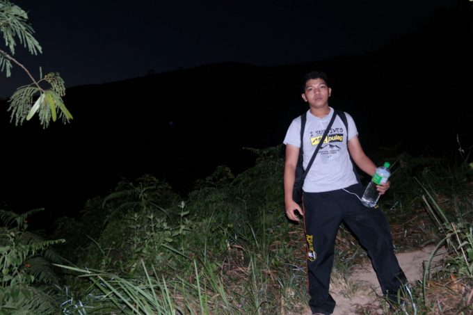 night-hiker-with-water-bottle