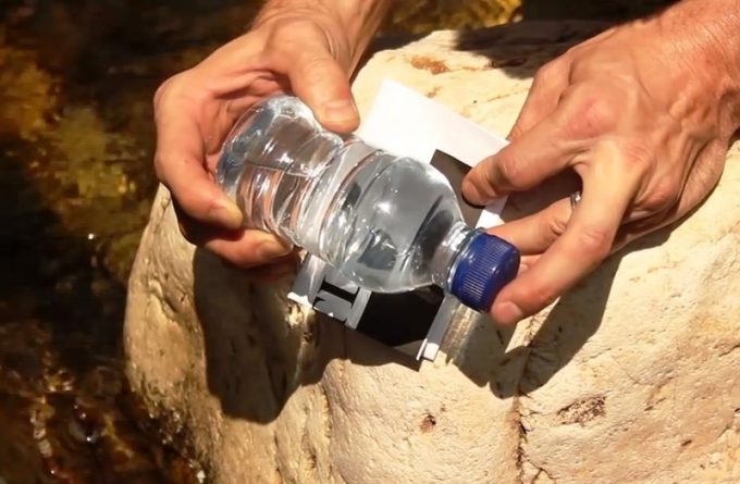 Starting a Fire with Bottle of Water